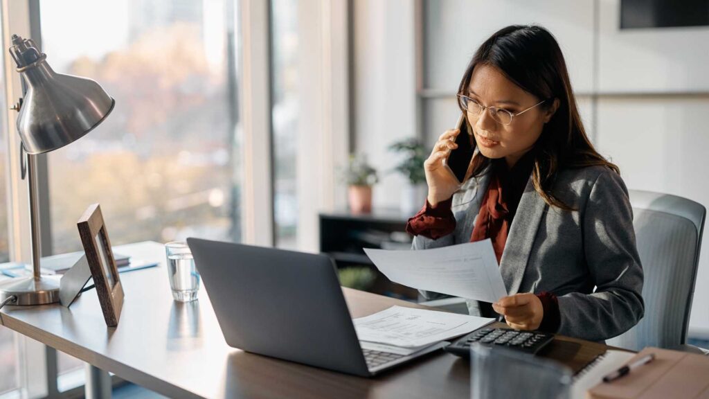 a professional woman in a call talking about a document