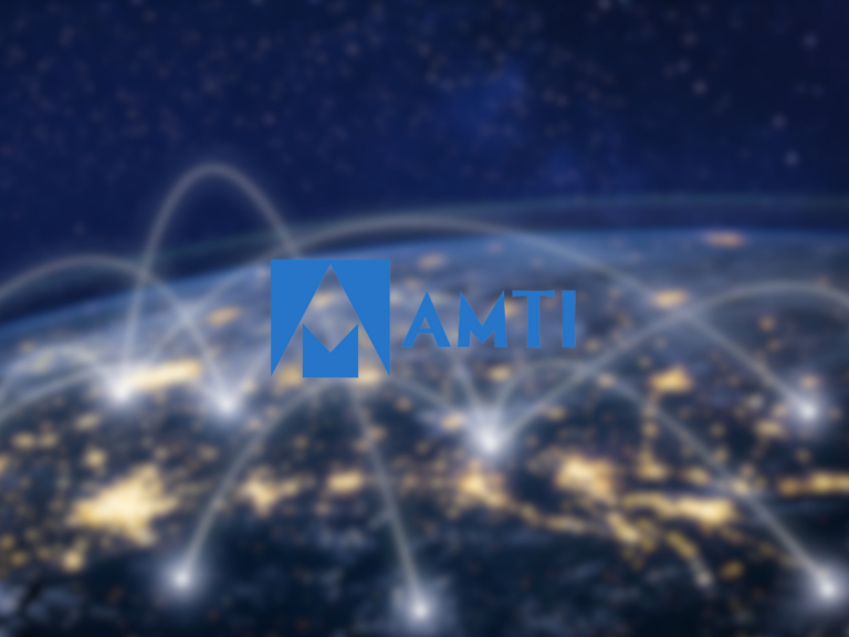A blurred global network background with bright points and connecting lines; a blue logo with the letters 'AMTI' centered in the foreground.