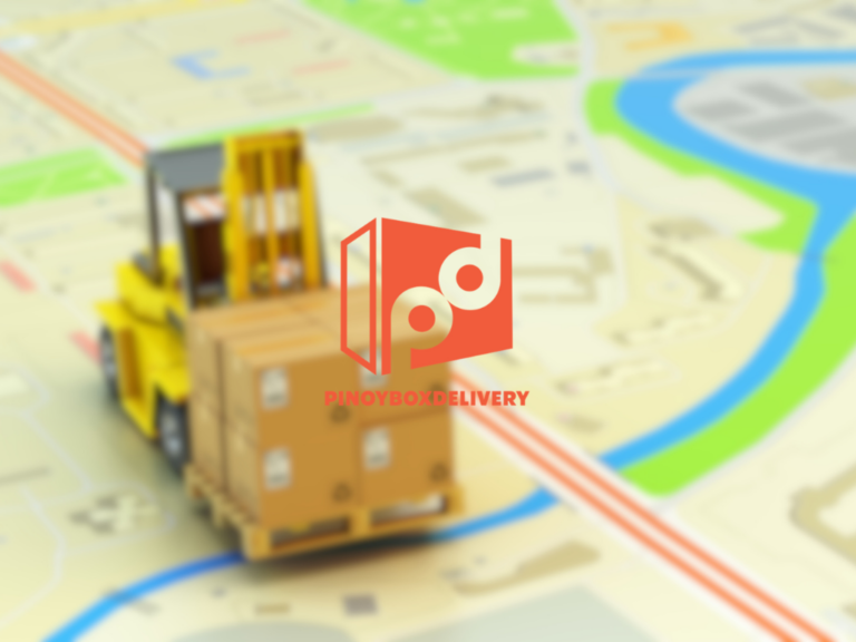 A blurred map with a yellow forklift and brown boxes in the foreground; a red logo and the text PINOYBOXDELIVERY are centered over the image.