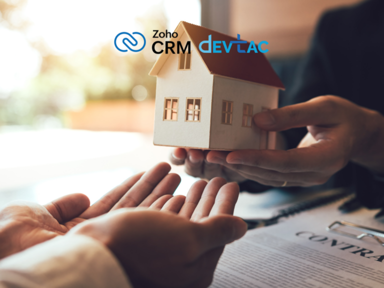 Hands passing a small cardboard house model over a contract, with Zoho CRM and DEVTAC logos in the top left.