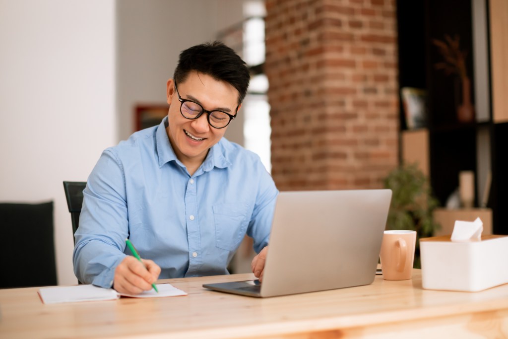 a male professional working at home