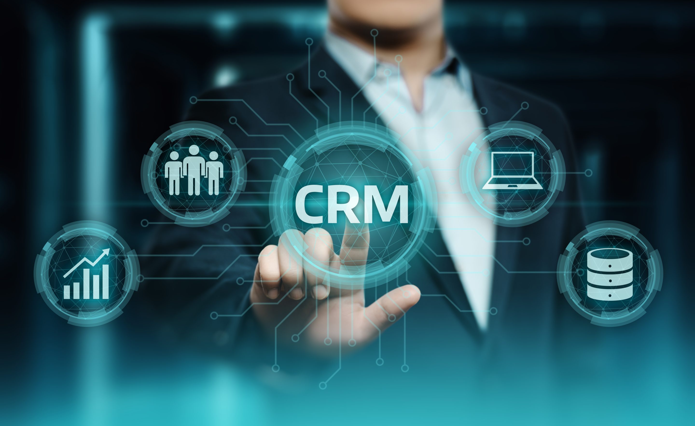 A man pointing on the acronym of "CRM"