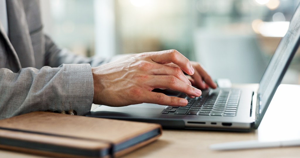 a businessman using his laptop