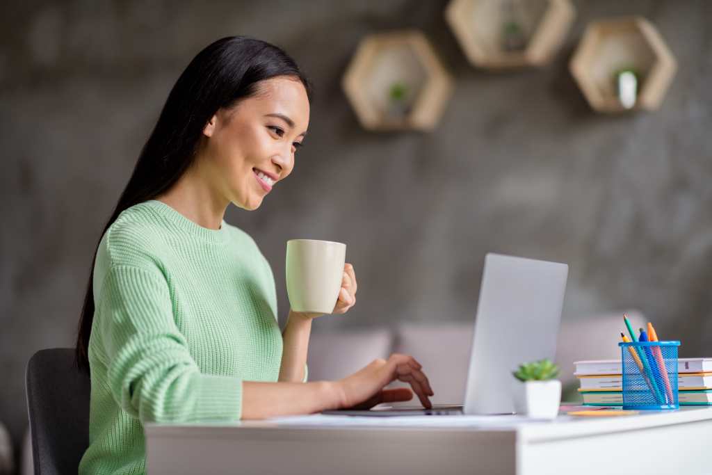 a marketing specialist checking her laptop