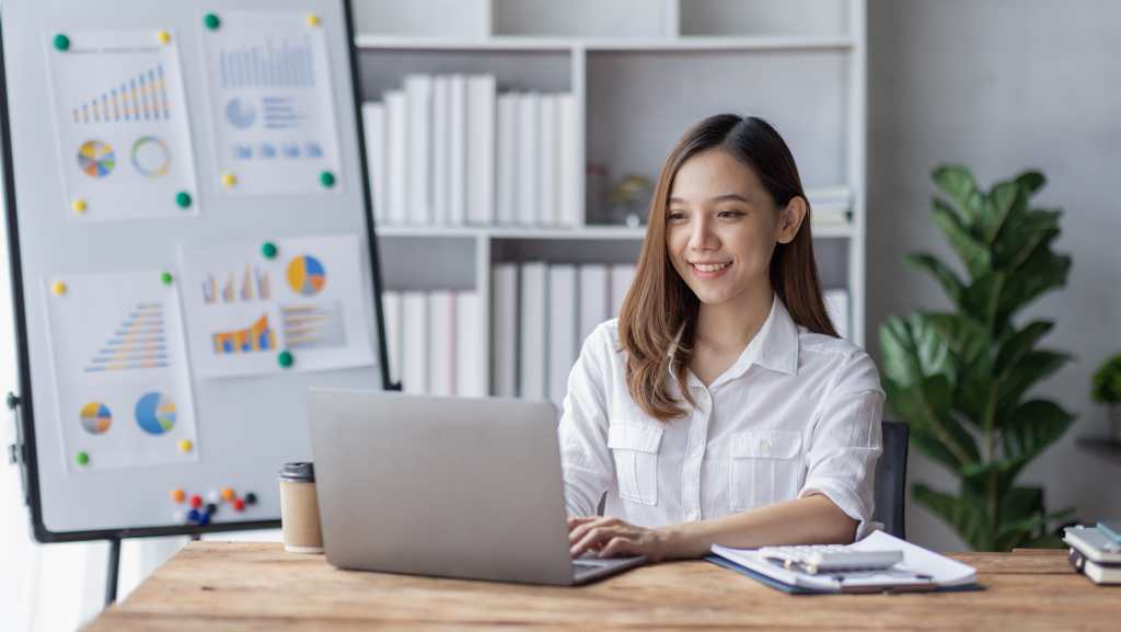 a female marketing specialist using her laptop