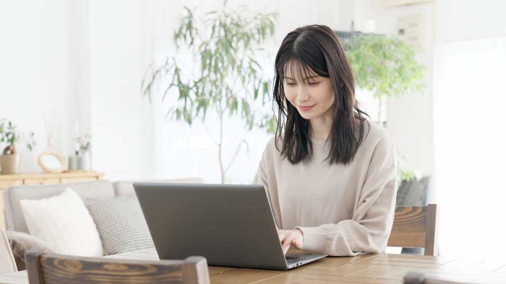 a woman using her laptop for work
