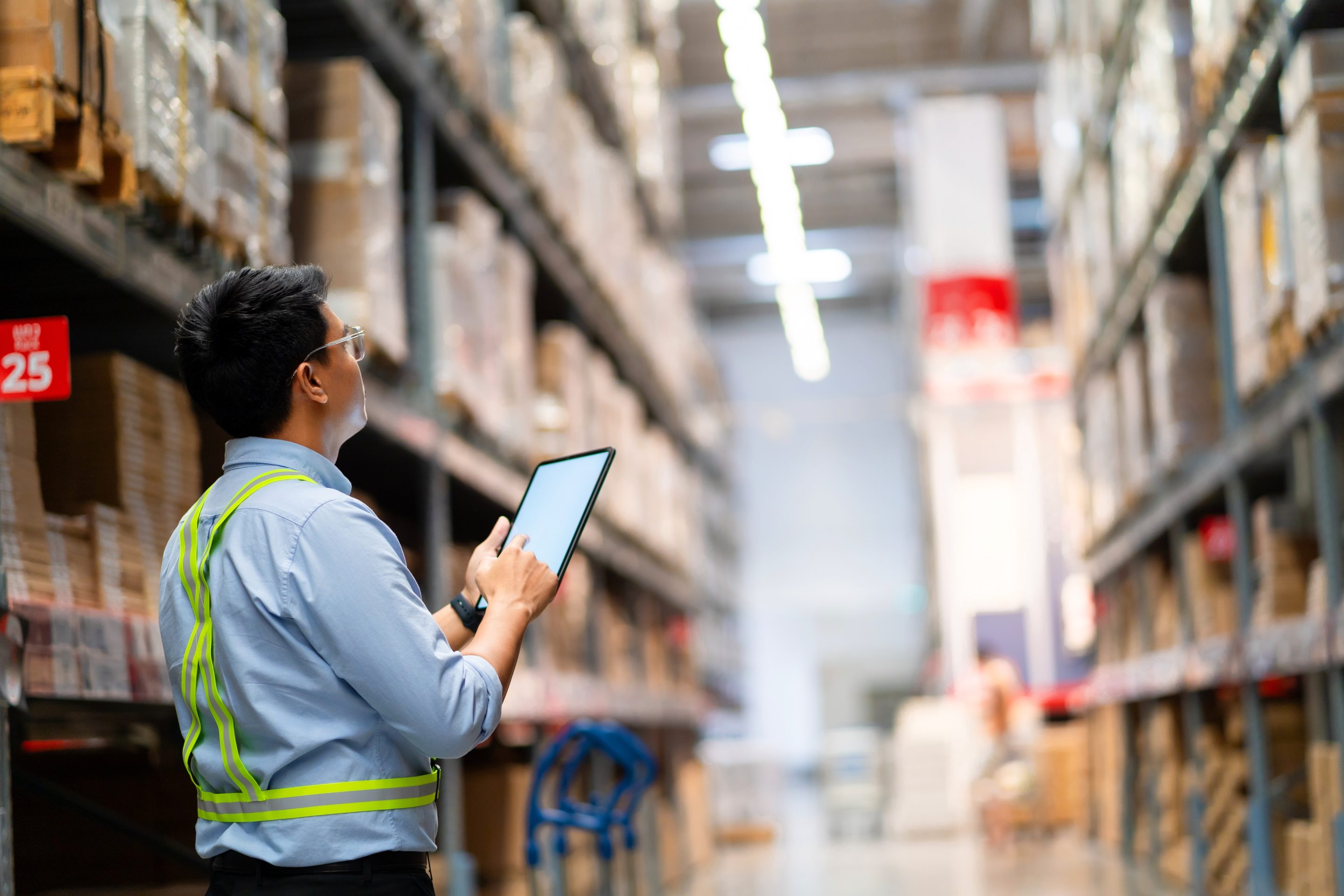 a warehouse worker doing inventory on the products