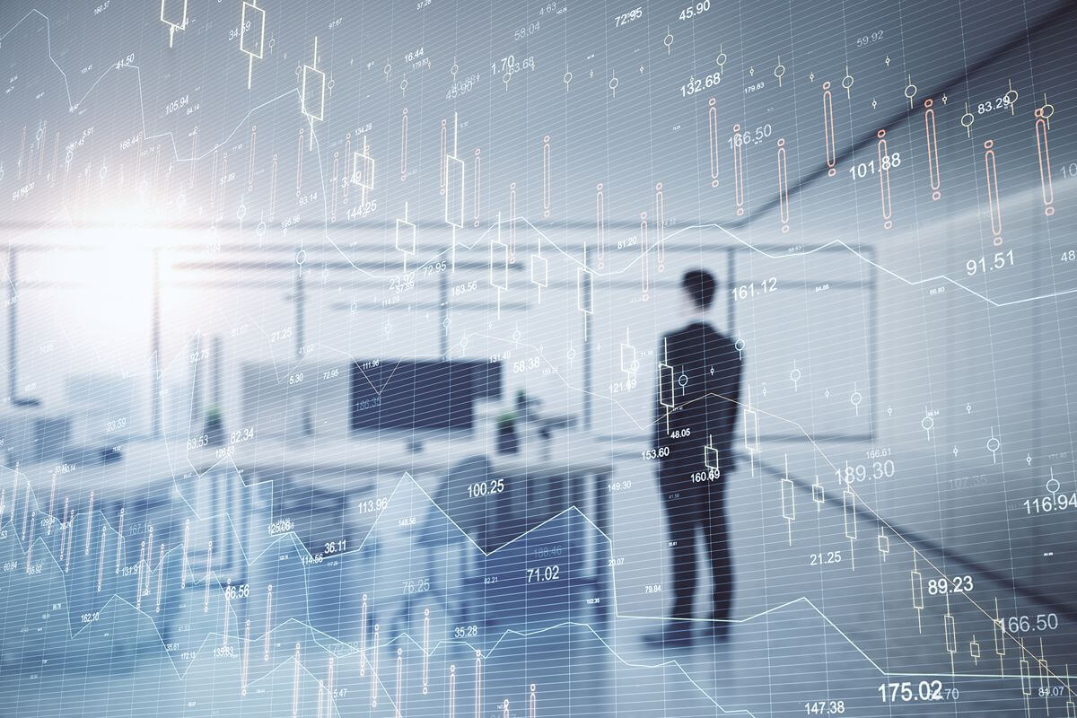 Business professional viewing digital data charts representing AI-powered automation and predictive business insights